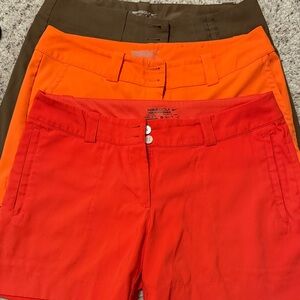 Nike Women's Athletic Shorts in Red, Orange, and Brown